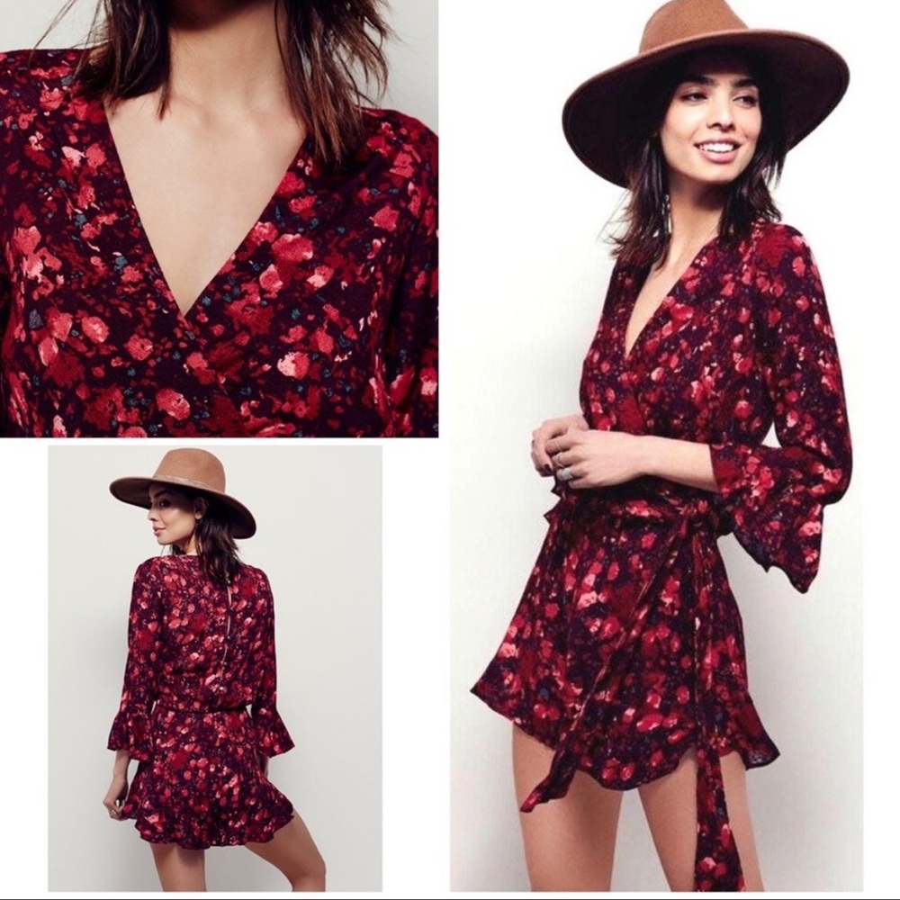 Free People 'All the right Ruffles' Floral romper. Wrap
style Boho Size Small